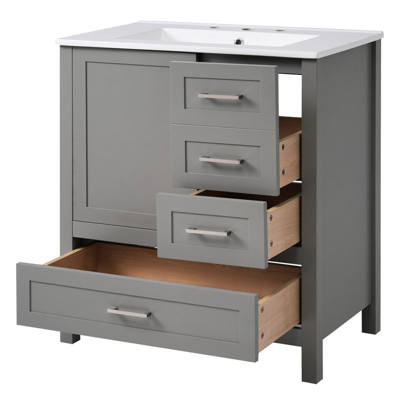 Meuble-lavabo de 30 po avec lavabo - finition grise. Bois massif et rangement spacieux. Fonction de fermeture en douceur. Luminaire élégant