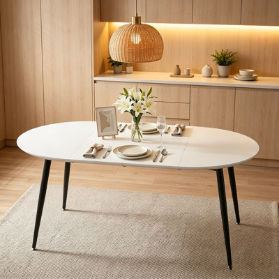 Utilisant un mécanisme télescopique intelligent, ce plateau de table en panneau de fibres à densité moyenne blanc est jumelé à des pieds en métal, ce qui donne une surface lisse et délicate. Son design unique crée une douceur.