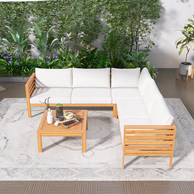 Ensemble de canapé d'extérieur en bois avec table basse en bois, coussins beiges résistants à l'eau et aux rayons UV, accessoires en métal d'acacia de haute qualité