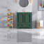 De meuble-lavabo vert avec lavabo en céramique, structure en bois massif et rangement spacieux