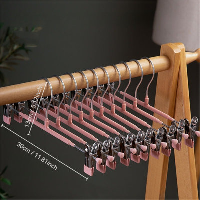 Cintre avec pinces pour pantalons