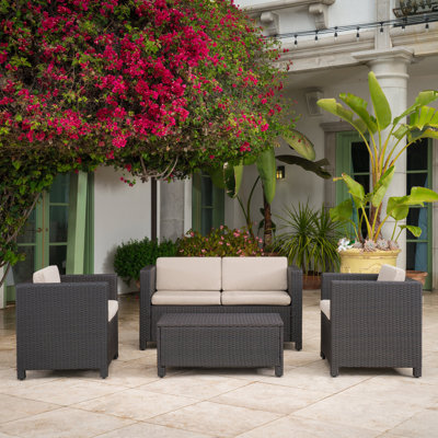 Arville 4 Piece Rattan Sofa Seating Group with Cushions