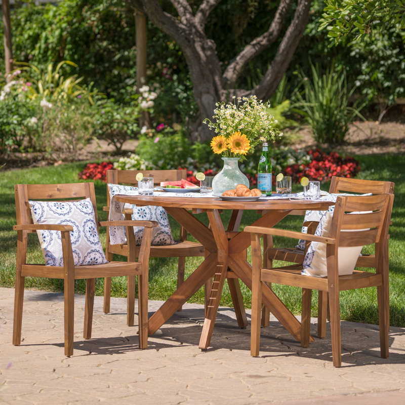 Renaud 4 - Person Wood Patio Dining Set with Round Table