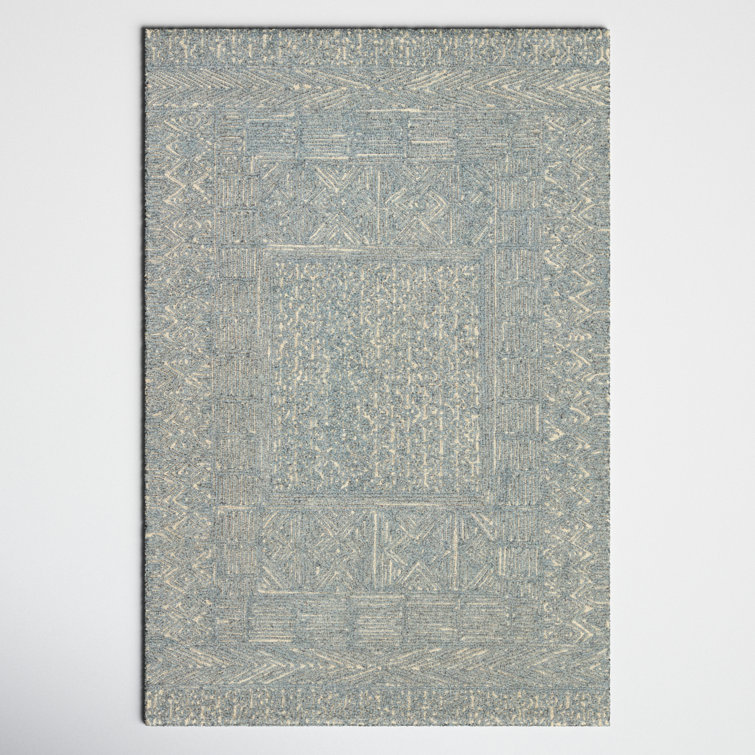 Christie Geometric Handmade Tufted Area Rug in Blue/Cream