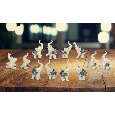 Figurine en éléphant ivoire 4 pièces Norreta