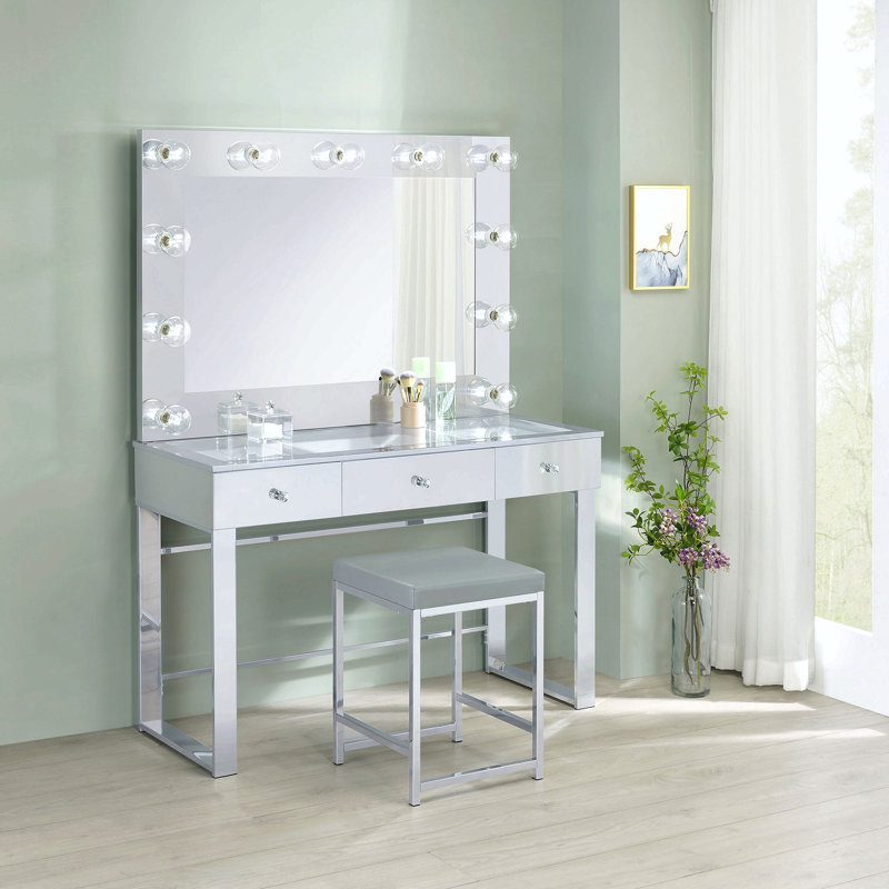 Coiffeuse chromée à 3 tiroirs avec miroir