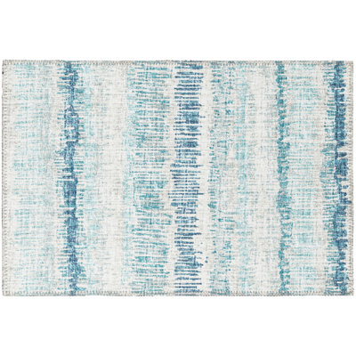 Tapis rayé bleu tissé à la machine