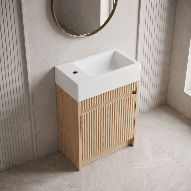 Meuble-lavabo suspendu de 47 cm (18,5 po) avec lavabo réversible en résine (gauche ou droite) et porte à ouverture par simple pression
