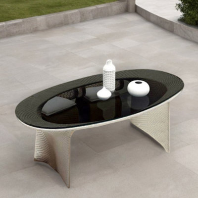 Ajnesh Oval 62.99'' L x 31.5'' W Outdoor Dining Table