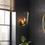 Jahkira Armed Wall Sconce