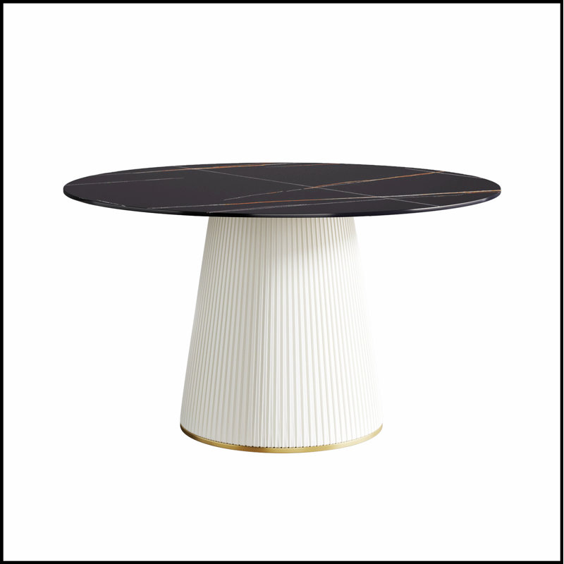Table de salle à manger ronde moderne en pierre artificielle noire avec base en polyuréthane beige, pouvant accueillir 6 personnes pour des repas et des rassemblements élégants.