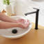 Robinet de salle de bain monocorps et monocommande avec bonde