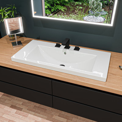 Lavabo de salle de bain rectangulaire encastré en céramique avec trop-plein