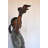Young Girl Holding a Bird Outside at The Park - Size: 21"L x 11"W x 49"H.