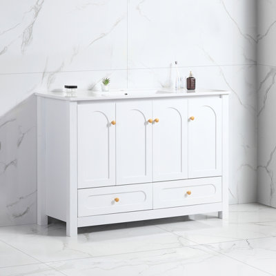 Meuble-lavabo de 48 po en céramique blanche avec armoire de rangement abondante avec 4 portes à fermeture en douceur et 2 tiroirs en bois massif robuste pour une fonctionnalité élégante et facile d'entretien