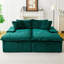 Chaise longue double recouverte de velours tortue, garnie de mousse comprimée, confortable pour 2 personnes dans un coin salon.