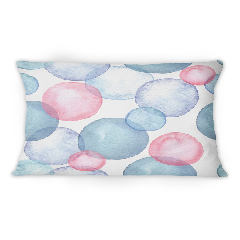 Coussin bleu et rose avec imprimé moderne