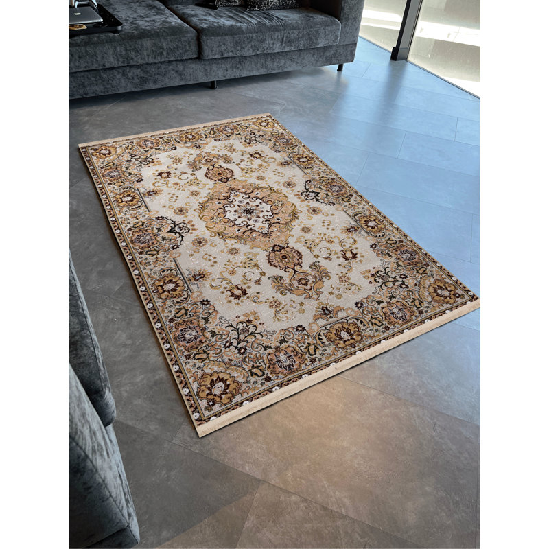 Tapis décoratif jaune et beige à motifs traditionnels