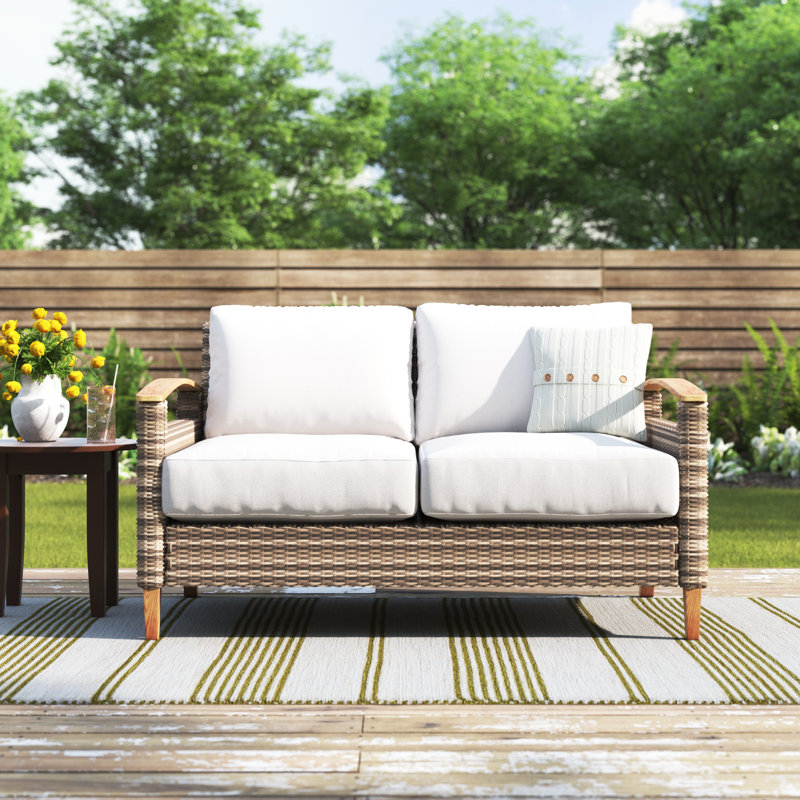 Courson 51'' Wide Straight Premium All-Weather Wicker Loveseat with Cushions, Frequency Parchment Sunbrella®, Brown/Chestnut
