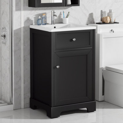Meuble-lavabo noir 20 po avec lavabo en céramique, porte à fermeture douce et support de rangement