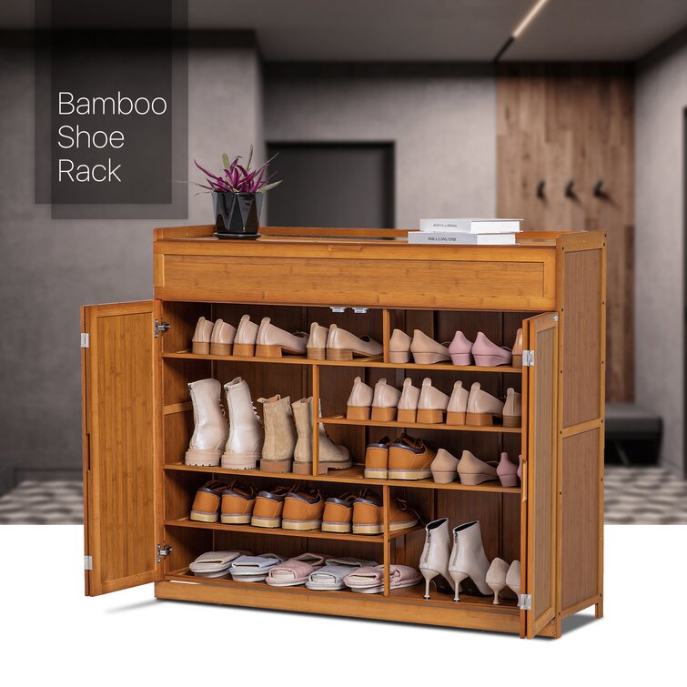 https://assets.wfcdn.com/im/46112747/resize-h755-w755%5Ecompr-r85/2021/202123604/6+Tier+30+Pair+Bamboo+Shoe+Rack+Cabinet+with+Folding+Door%2C+Compartment+Space+for+Boots%2C+for+Home.jpg
