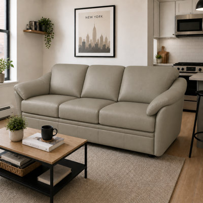 Ramdev Top Grain Leather Sofa with Cushioned Back and Pillow Top Arm