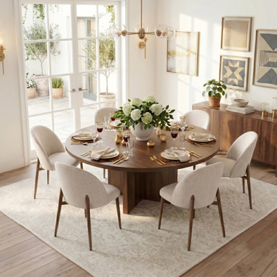Ensemble de salle à manger rond avec table en noyer et chaises rembourrées à pattes en métal