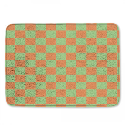 Tapis de bain vert et orange à damier