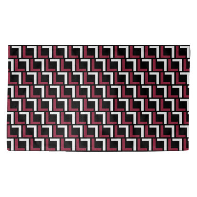 Tapis géométrique rose / noir / blanc