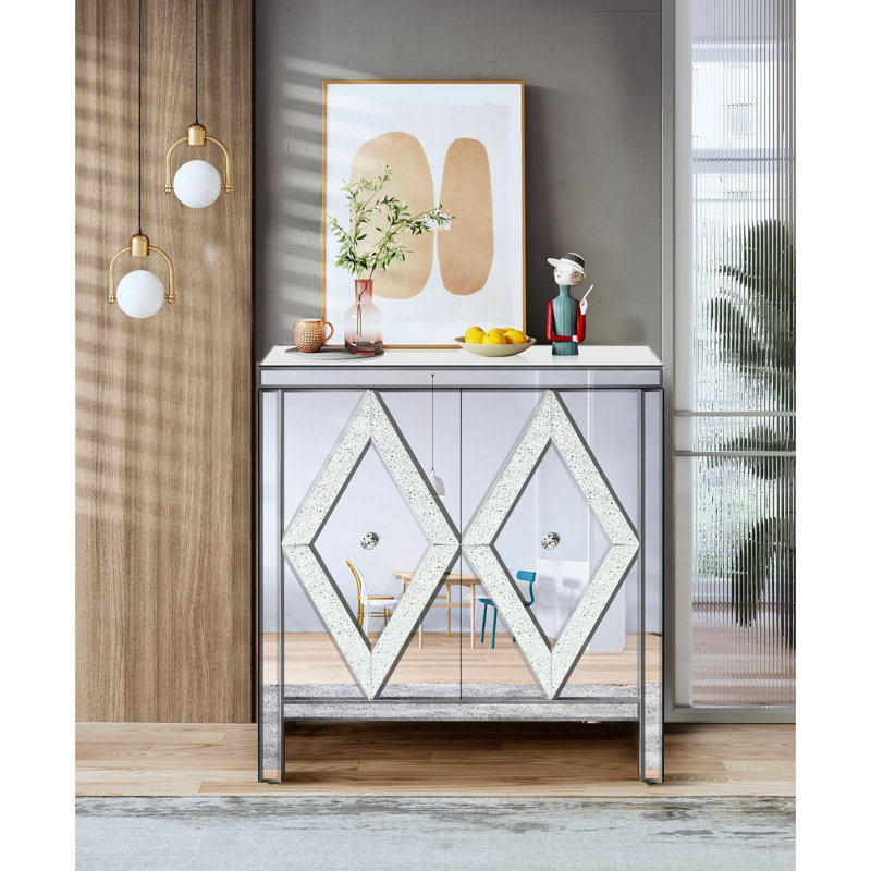 Armoire de rangement avec bordure miroir et motif en losange, argentée, idéale pour le salon, la salle à manger, l'entrée ou la cuisine. Construction robuste.