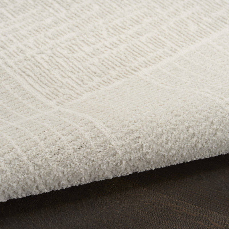 Tapis d'intérieur moderne ivoire Ebern Designs Reimann, Rectangle 5 pi x 7 pi