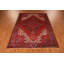 Tapis traditionnel rouge à motif géométrique 8 x 10