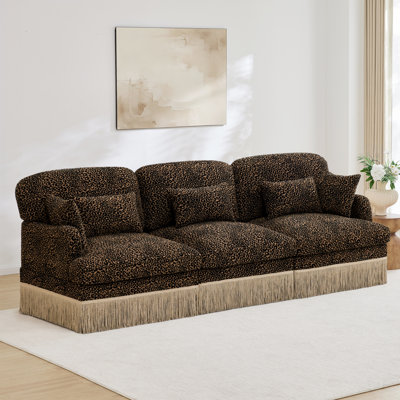 Canapé 3 places à imprimé léopard Comfy avec bordure à pampille, conception ergonomique et flexibilité modulaire pour les salons modernes