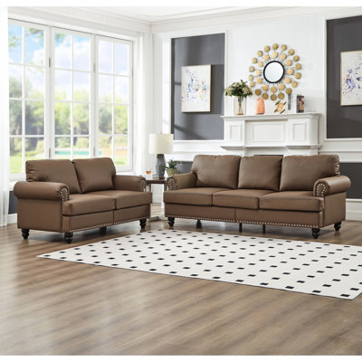 Moderne classique 2 + 3 places et avec clous, cuir de vache rembourré, brun, design américain, accoudoir rond, décoration clous argentés, structure en bois massif, coussins à ressorts ensachés, coussin amovible