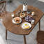 Table de salle à manger ronde brune pour salle à manger / cuisine-428504153