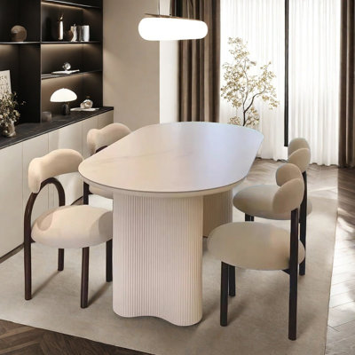Cream-style oval dining table and chairs
