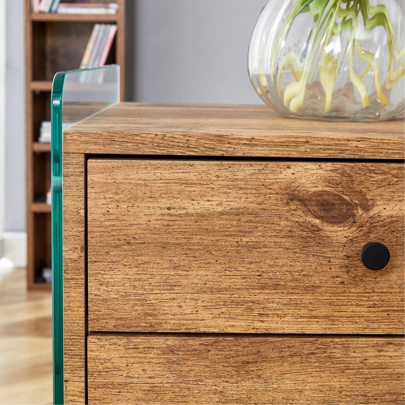 Table de chevet à double tiroir. La surface de la planche est en panneau de fibres à densité moyenne avec un autocollant de grain de bois et les deux côtés sont en verre trempé.