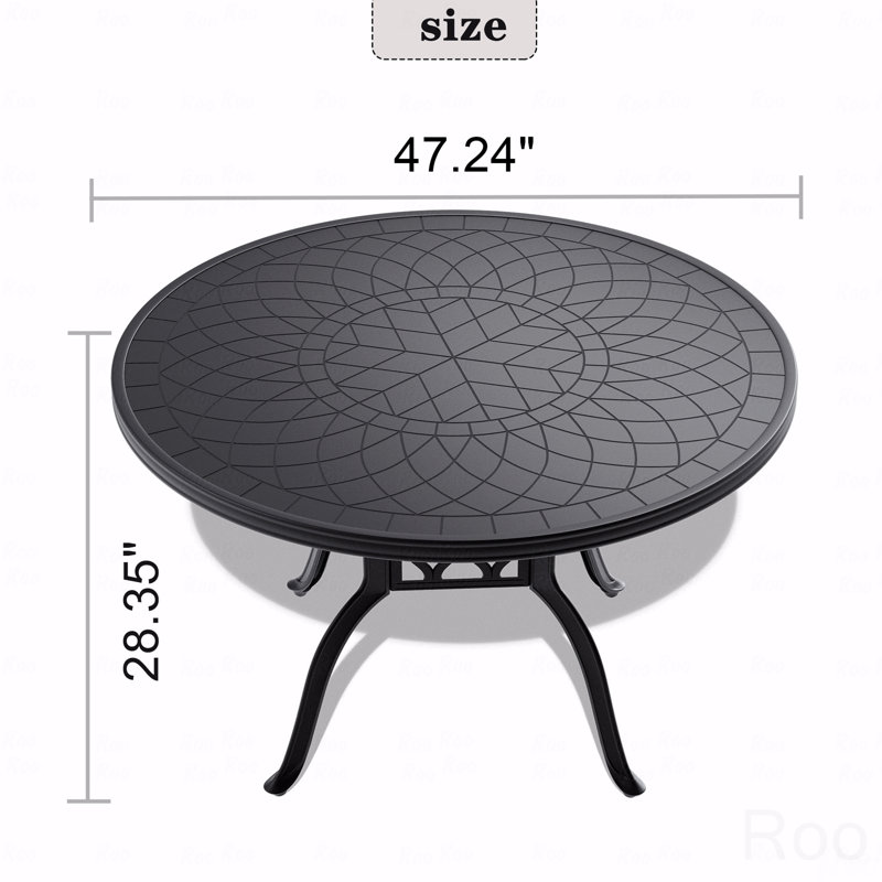 Table de salle à manger en fonte d'aluminium avec cadre noir et texture sculptée sur le plateau de table