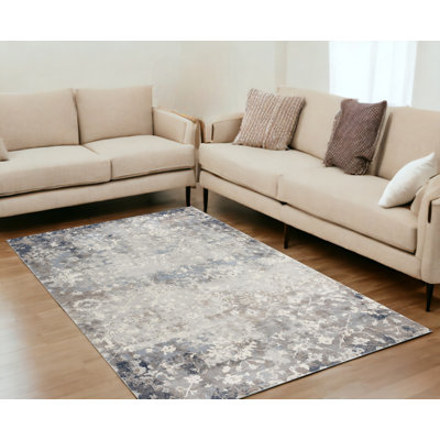 Tapis gris à motif floral Romulus