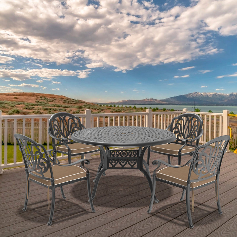 Mobilier de patio en fonte d'aluminium avec structure noire et coussins de siège