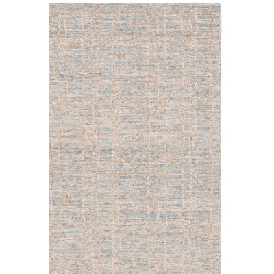 Tapis géométrique beige / bleu en jute de laine touffeté à la main Alvonia