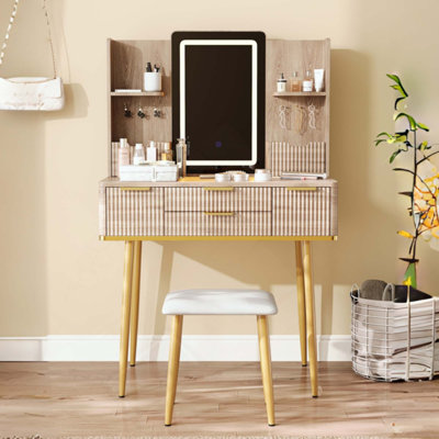 Bureau de coiffeuse à 4 tiroirs avec miroir à DEL et détails sculptés, table de maquillage cannelée avec pieds en métal et tabouret en polyuréthane, coiffeuse sculptée avec rangement pour bijoux pour la chambre à coucher