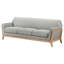 Canapé d'inspiration rétro avec accoudoirs évasés et mousse moelleuse confortable