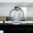 Arbelaez Modern Black Metal Hand Sculpture with Circular Design on White Marble Base 15" for Living Room or Office Decor