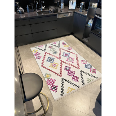 Tapis décoratif moderne à motif géométrique rose et beige