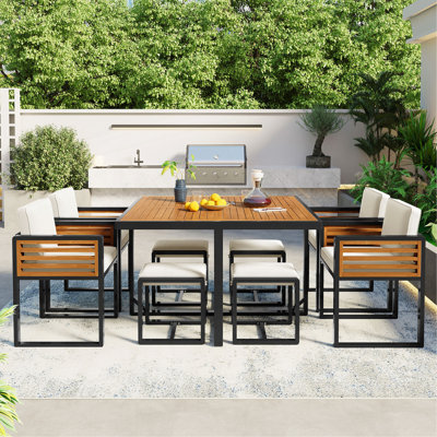 Ensemble de salle à manger 9 pièces pour patio en bois d'acacia, ensemble de patio extérieur peu encombrant, 4 chaises rembourrées, 4 repose-pieds et 1 table carrée pour la cour, le jardin, la terrasse et la piscine