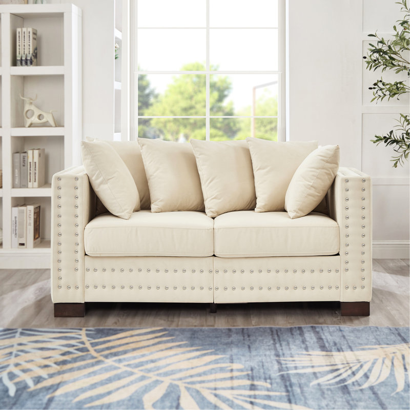Velours abricot moderne, accoudoir carré avec décoration clous argentés, structure en bois massif, coussin de siège confortable, housses amovibles, rangement sous les sièges revêtu de style, décoré par des clous,