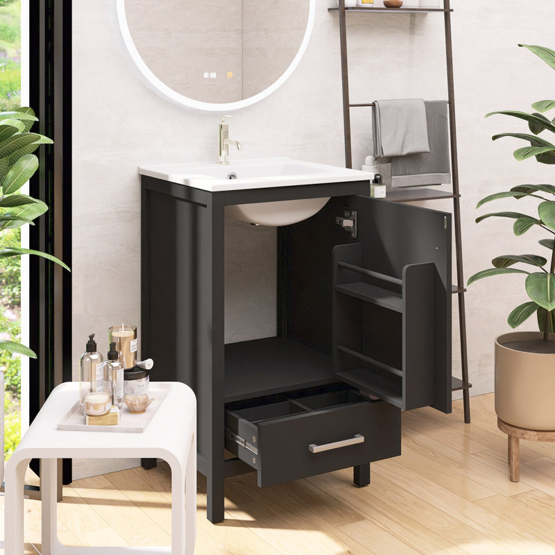 Meuble-lavabo gain de place avec lavabo en céramique, tiroirs à fermeture douce, organisateur de porte, tiroir séparateur et pieds en plastique réglables.