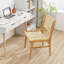 Chaise en rotin avec dossier tissé en canne naturelle et structure en bois de teck