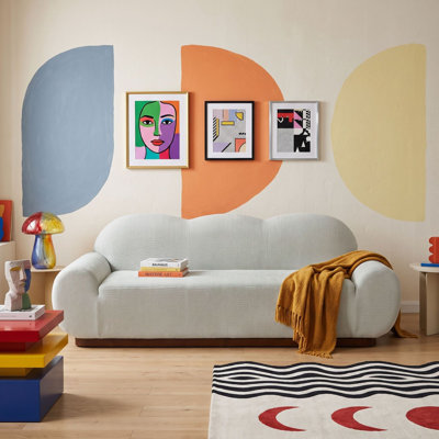 Canapé 3 places contemporain inspiré des nuages, avec revêtement doux et arrondi et accoudoirs arrondis pour salon